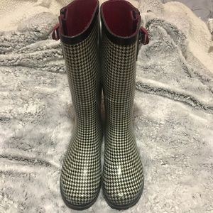 Black and white rain boots